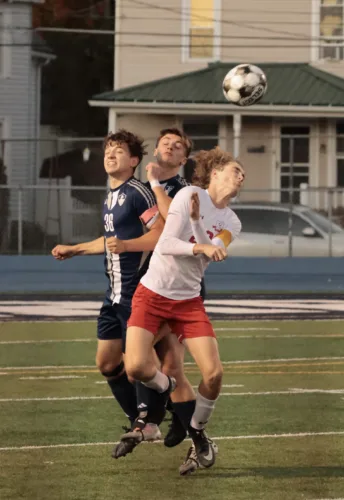 Warren boys, girls post soccer wins